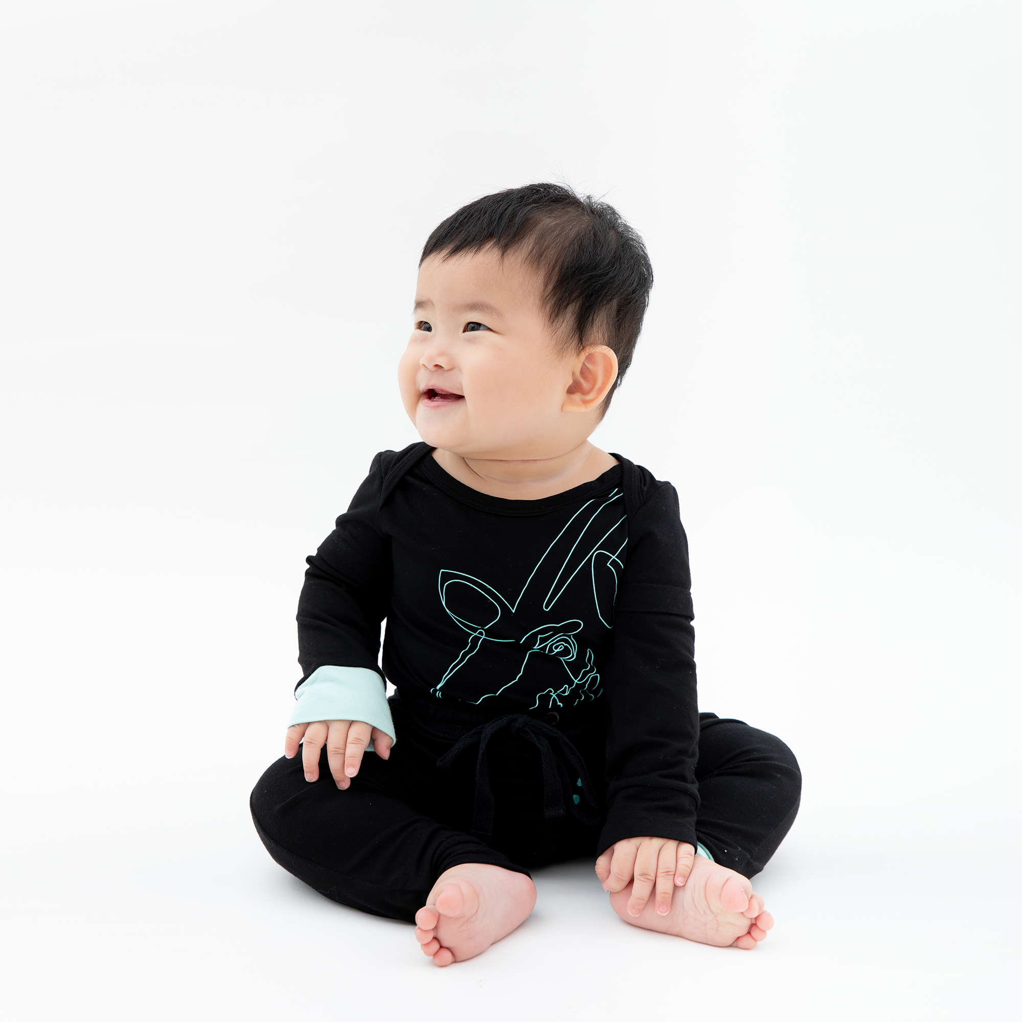 Saola Long Sleeve Onesie by ikkikidz | Purchase at The Green Collective